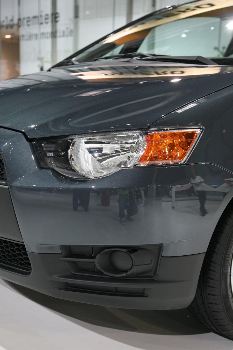  Mitsubishi Colt 2009 года  (фото 12 из 36)